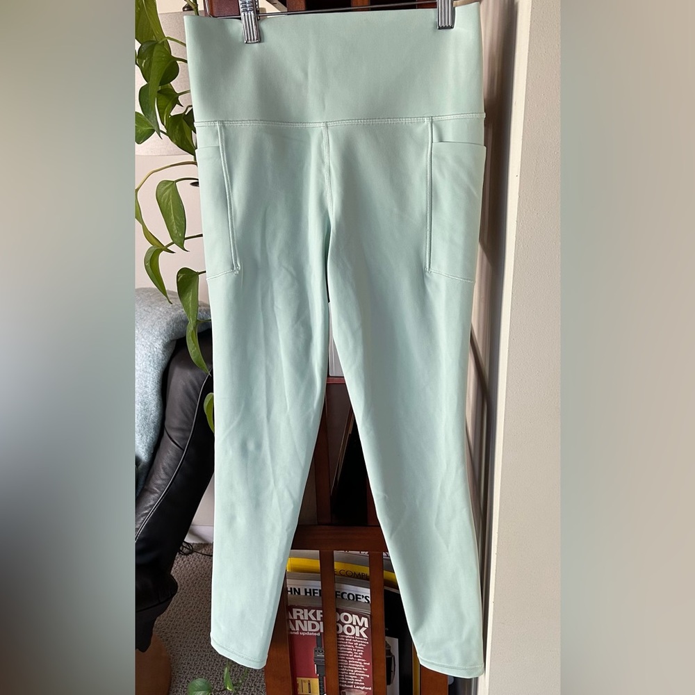 Athleta Salutation Stash Tight NWOT. Size Small. Mint Green.